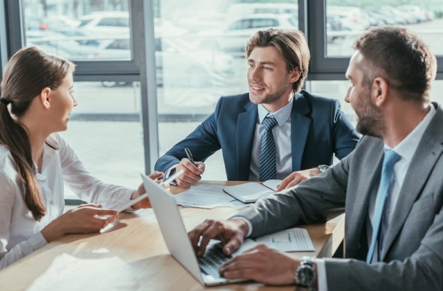 Business team working together in office Business team working together in office
